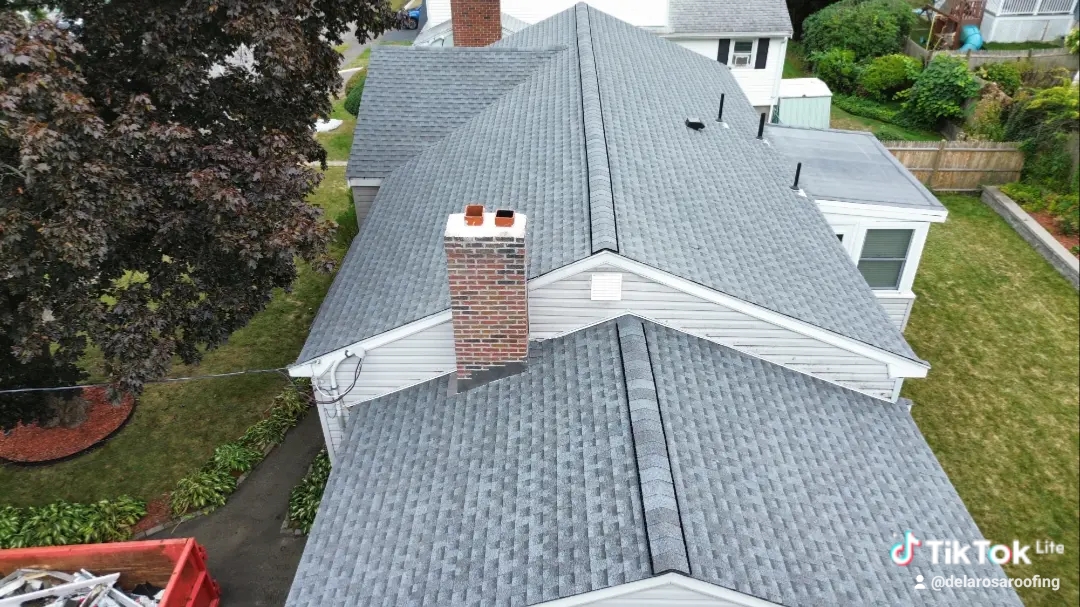 Finished gray shingle roof installed by De La Rosa Roofing